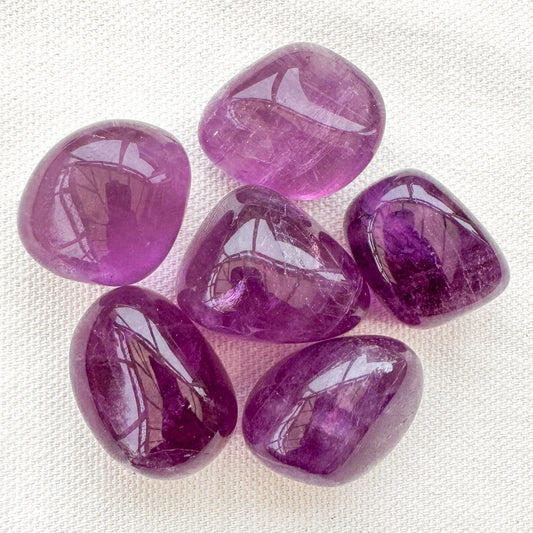 Purple Fluorite Tumble Stones - Sussex Stones Crystal Shop