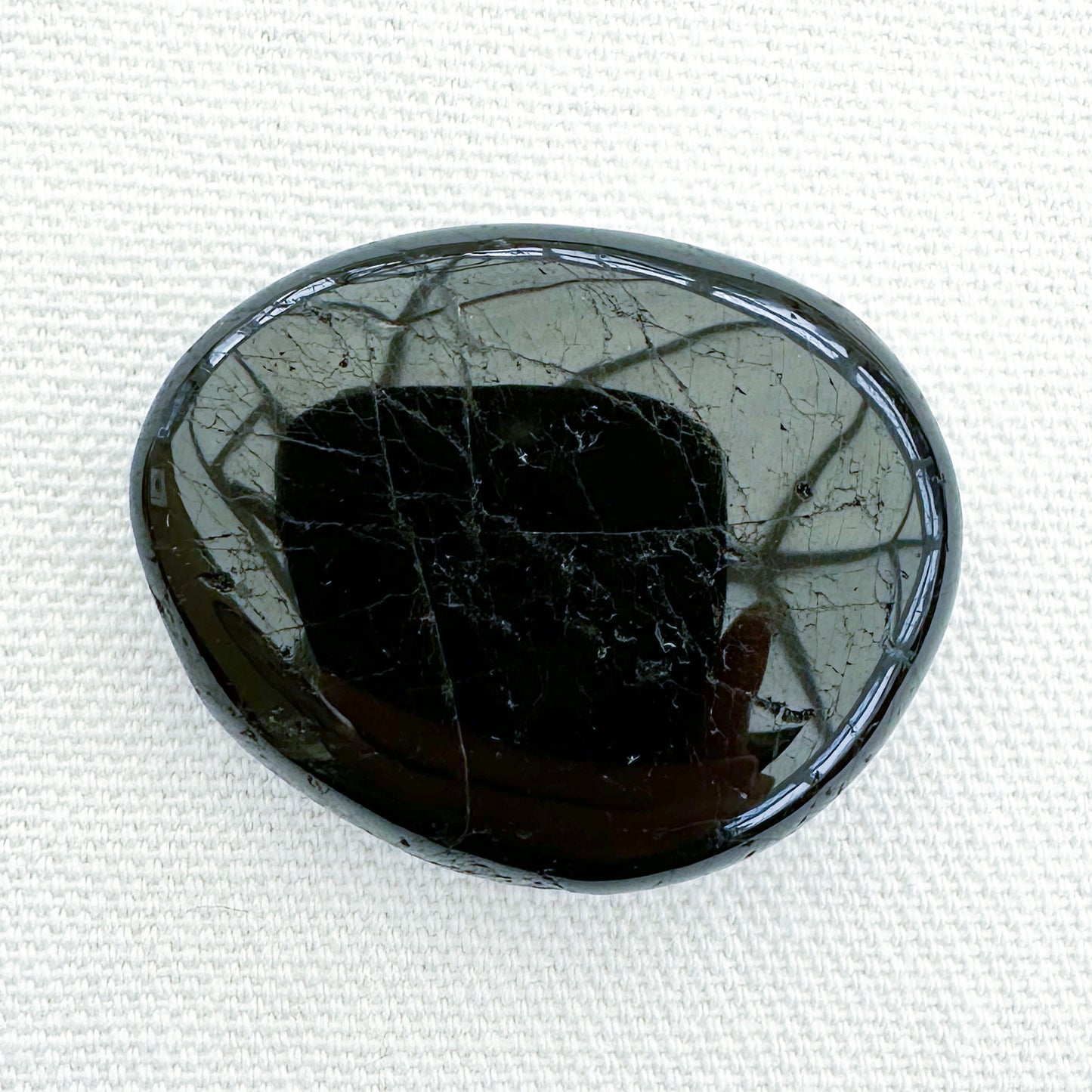 Black Tourmaline Flat Palm Stone - Sussex Stones Crystal Shop