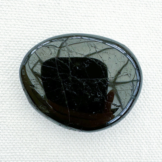 Black Tourmaline Flat Palm Stone - Sussex Stones Crystal Shop