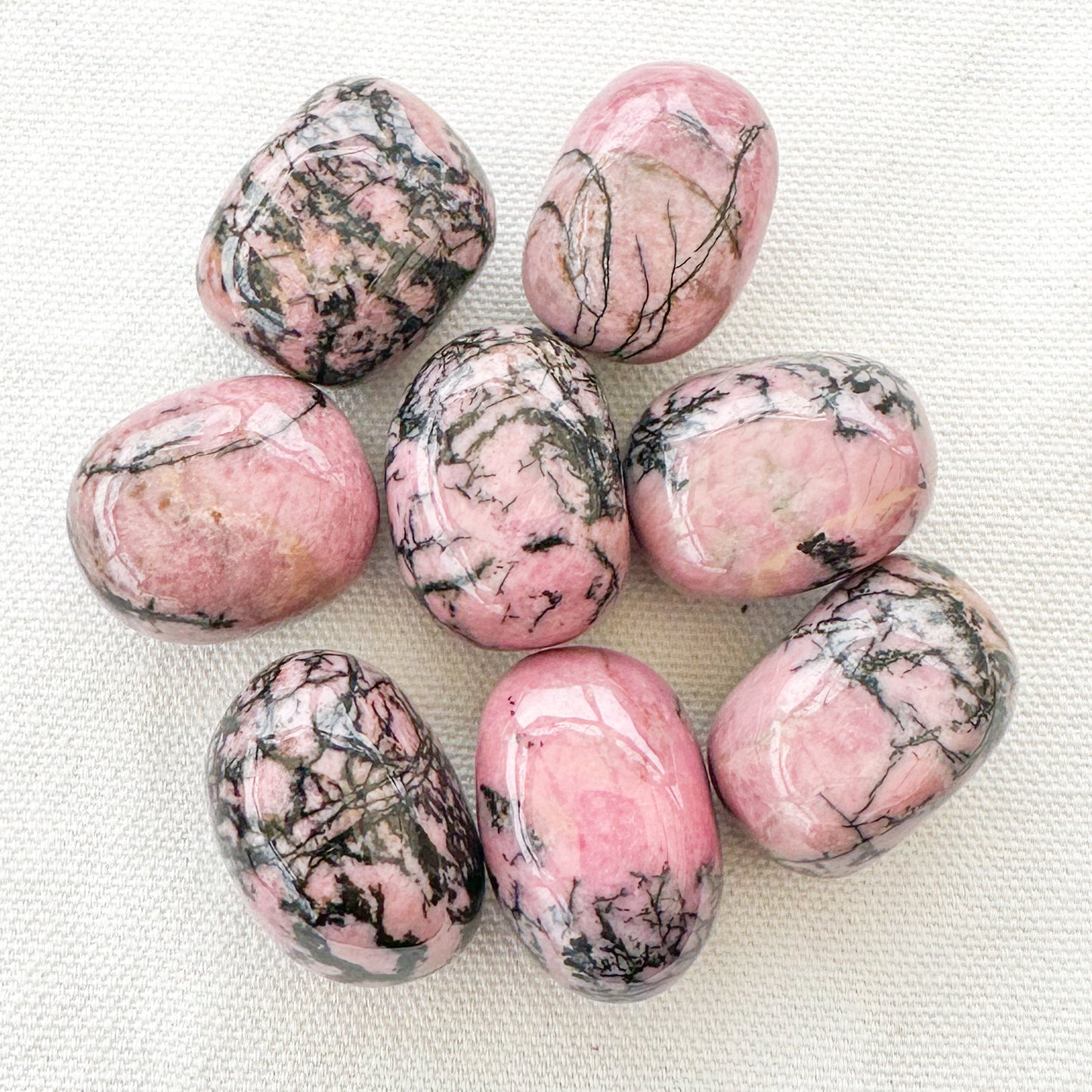 Rhodonite Tumble Stones - Sussex Stones Crystal ShopRhodonite Tumble Stones - Sussex Stones Crystal Shop